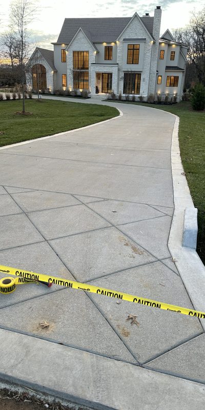 IMG_1976 Freshly stamped concrete driveway, blocked by caution tape at Cody-X. Cody-X Pressure Washing