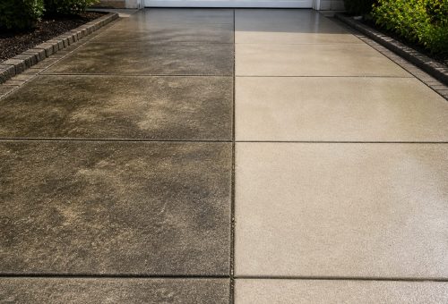 ChatGPT Image May 4, 2026, 02_33_39 PM Split concrete driveway: one side dirty, the other cleaned by Cody-X. Cody-X Pressure Washing